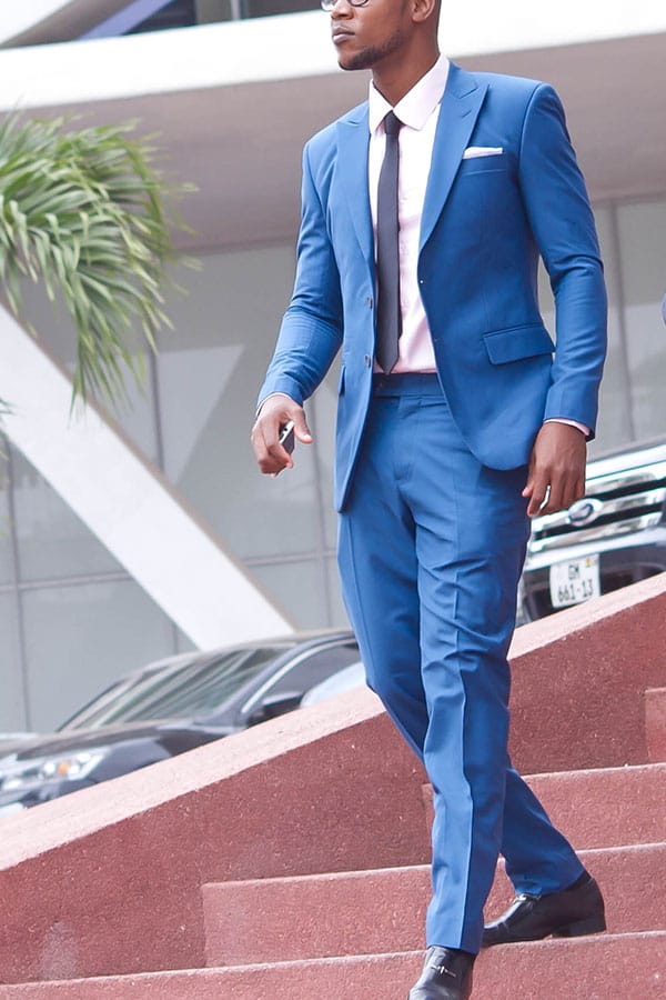 bespoke men's blue suit by Ghanaian tailor